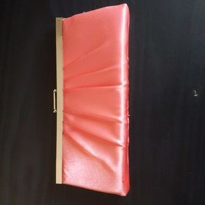 Soft pink clutch